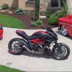 Project Diavel: Larry Lulay's Ducati Diavel in a panoramic view with some of Don Lulay's red cars in front of his house  - Taken on Red Car Photo Day - May 2015.